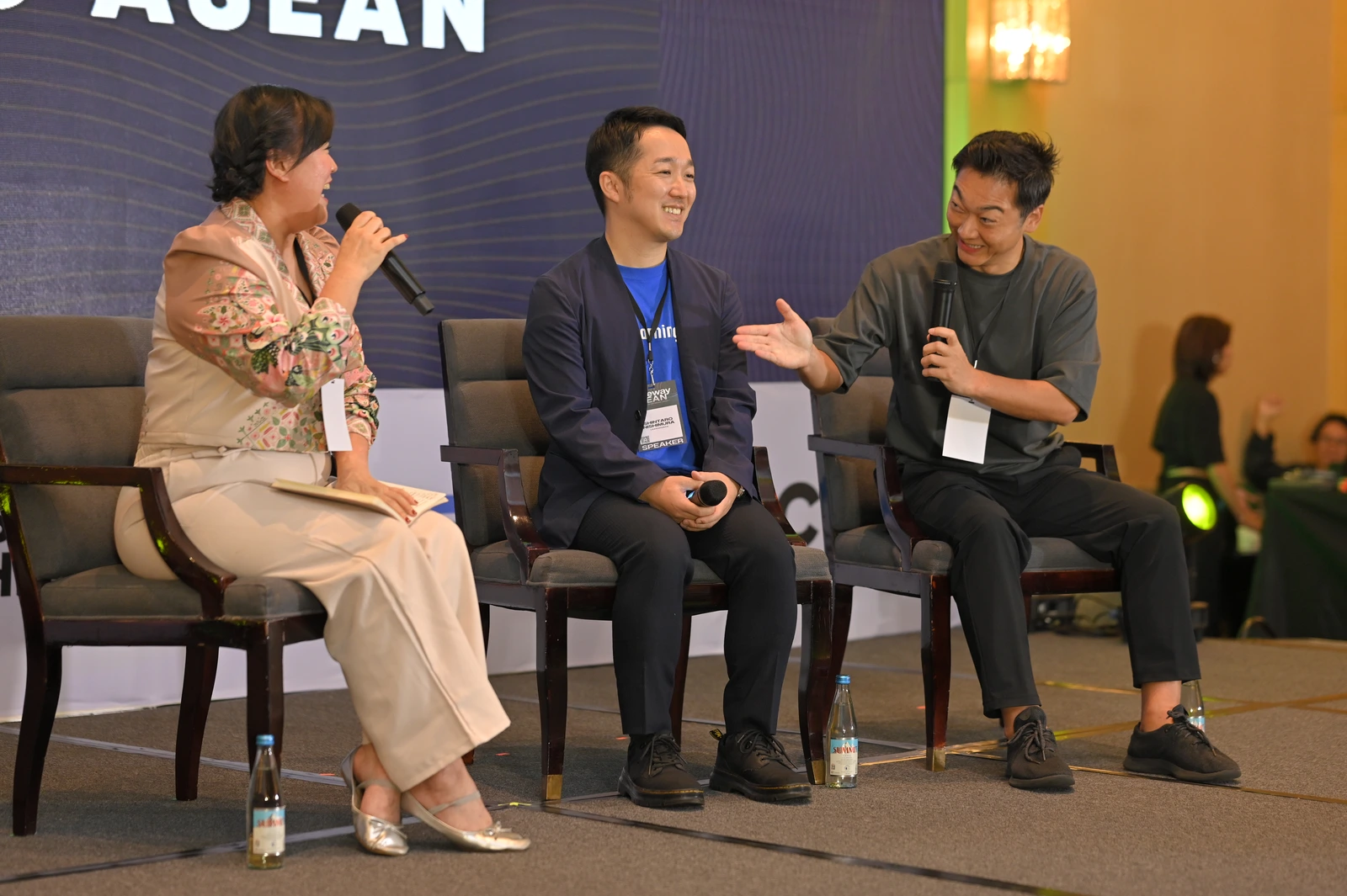 A moderator and two panellists in conversation at a Gateway ASEAN session