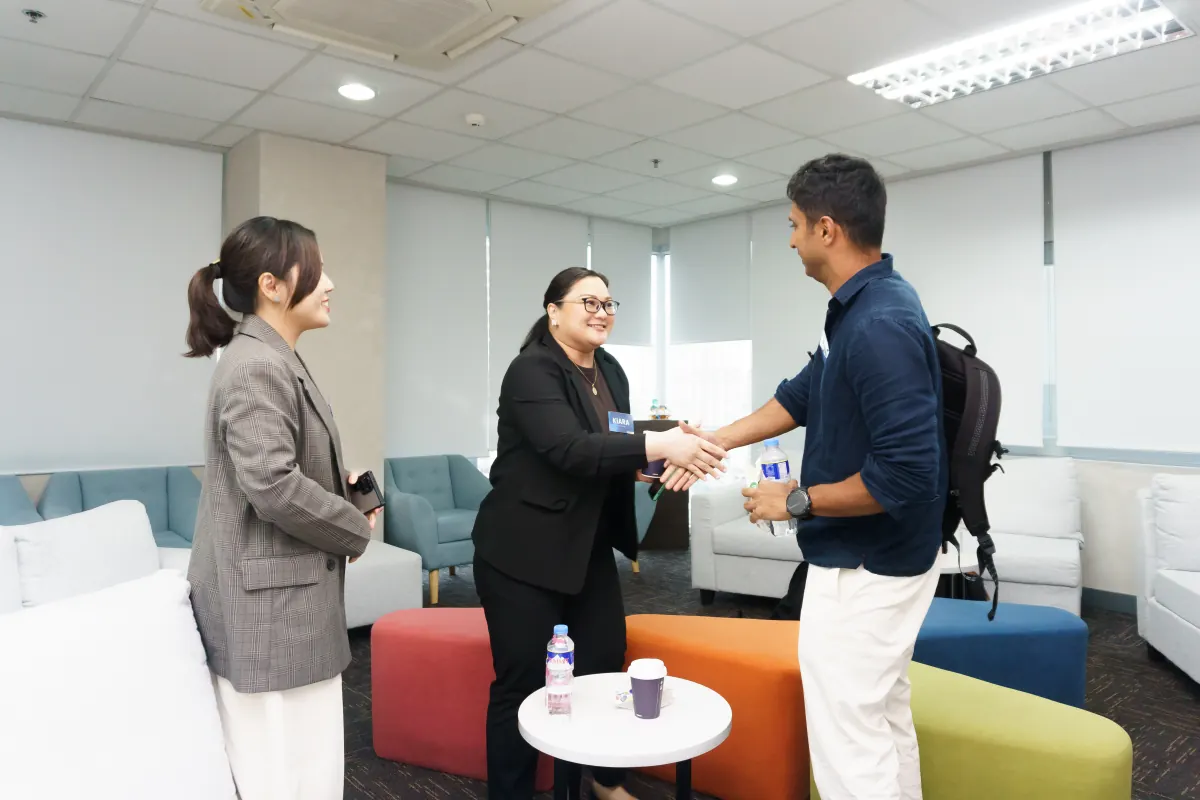 TechShake team welcoming visitors at a meeting
